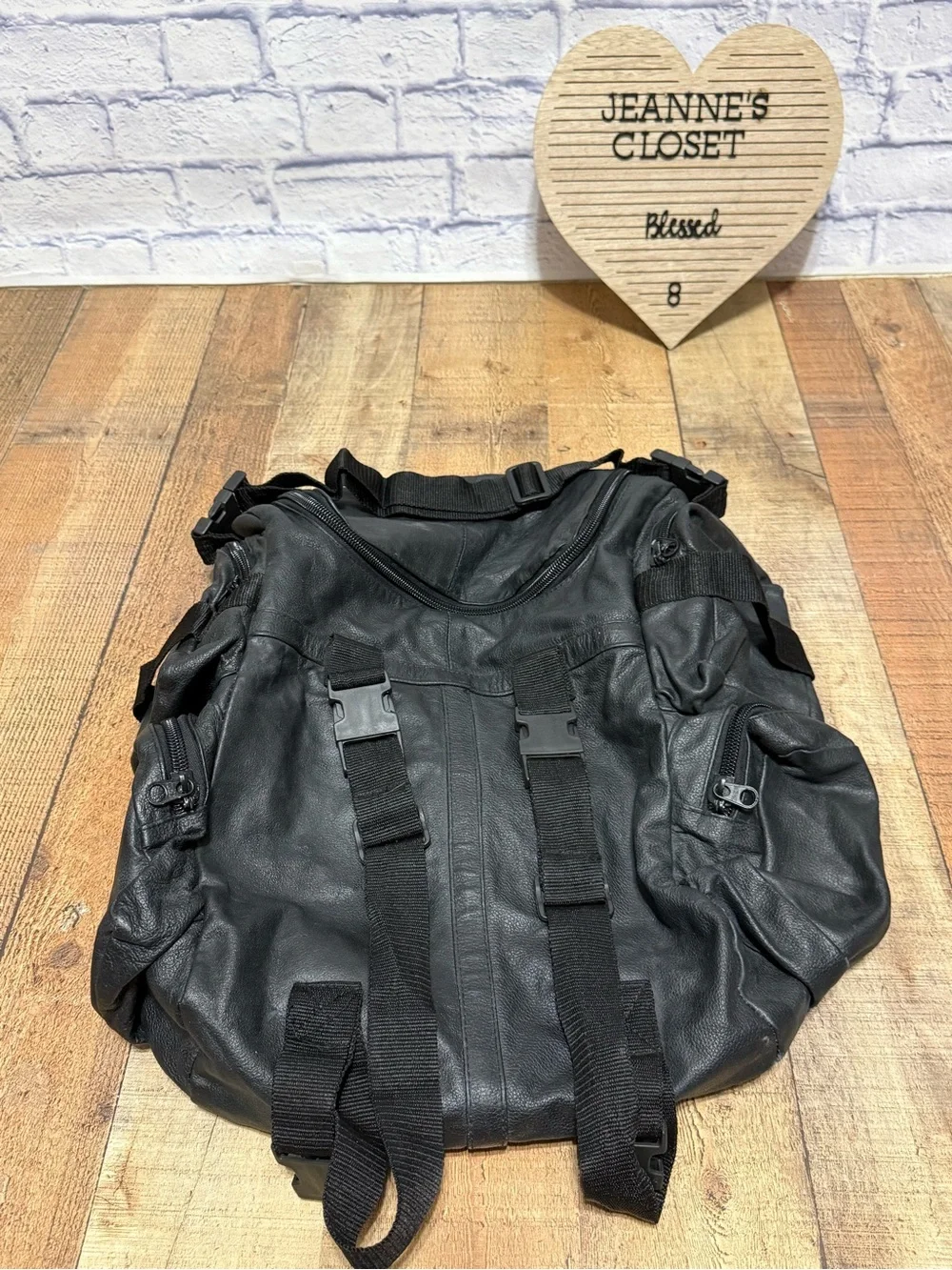 Heavy Duty Black Leather Motorcycle Backpack  Pre owned good condition.. there i
